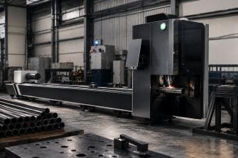 Bodor CNC tube laser machine inside Summit Engineering's stone wall mill