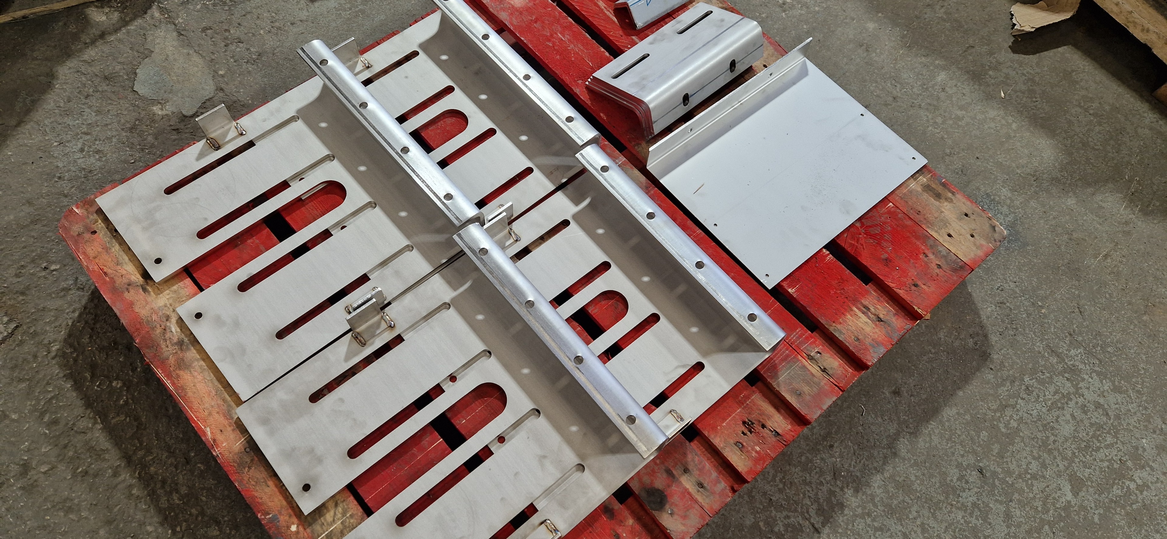Door brackets and fabricated components