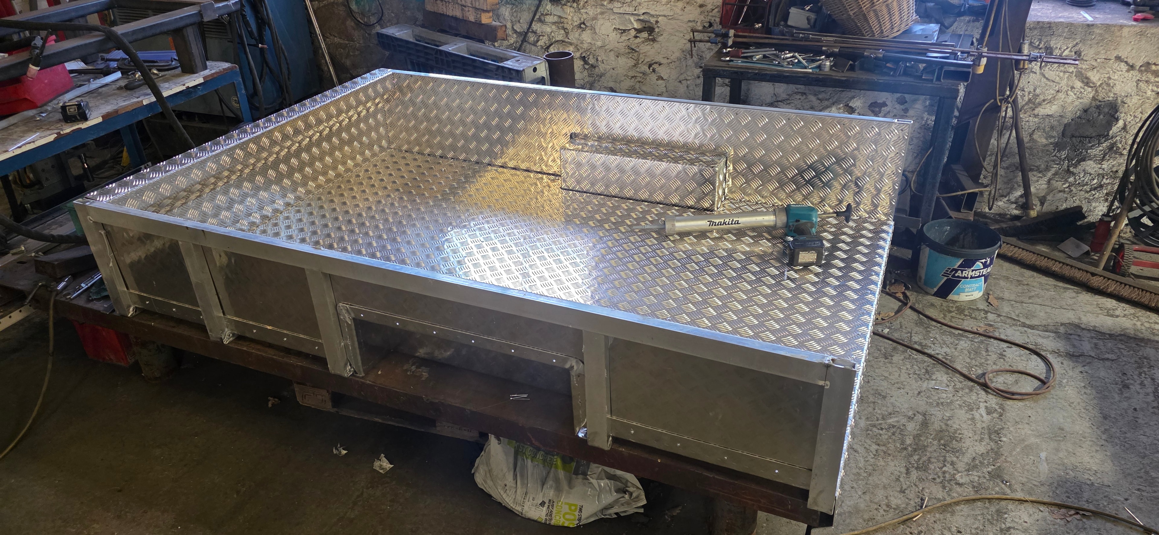 Aluminium chequer plate fabricated storage box in workshop